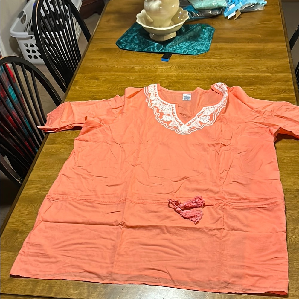 Chic Orange Tunic with Tassel Accents